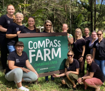 A group of Youi employees helping the community.