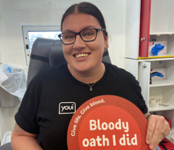 A Youi employee donating blood.