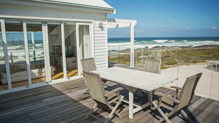 Holiday home by the beach with an outdoor setting