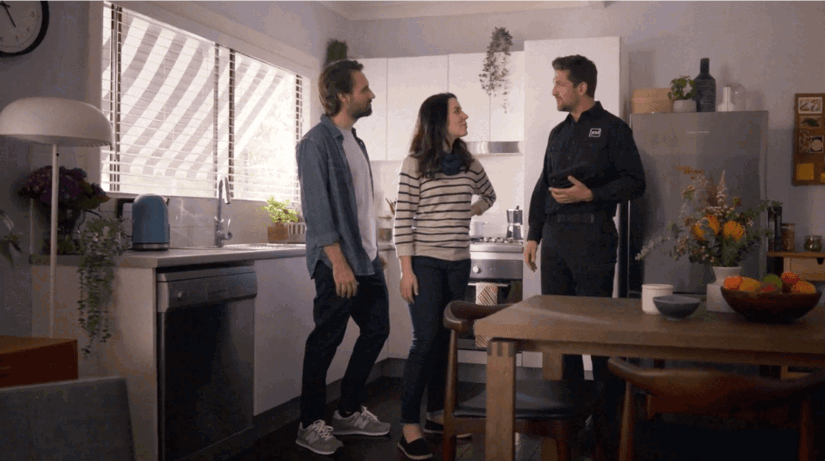Happy homeowners admiring their home after a Youi claim
