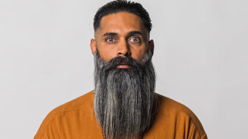 Image of Shazz looking straight faced.