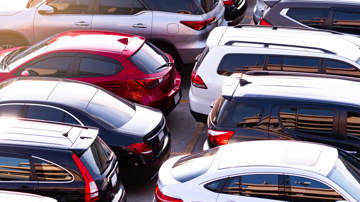 A group of vehicles in a carpark