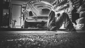 Mechanic under a car