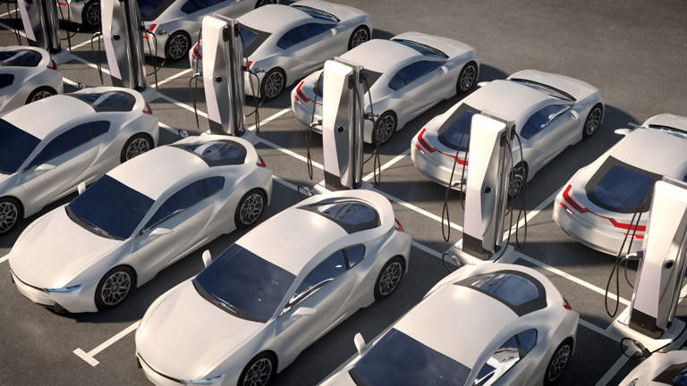 Image of parked electric vehicles charging.
