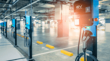 Electric car charging stations in an underground carpark.