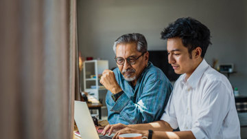 A father and son organising a guarantor home loan