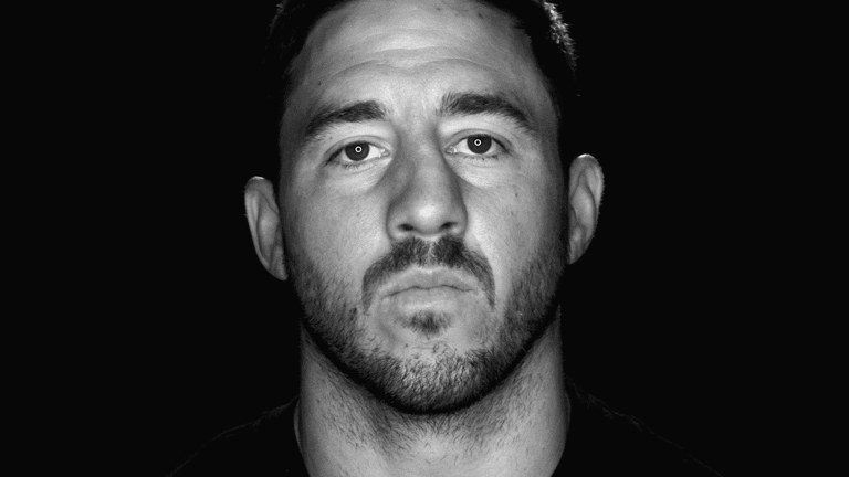 Black and white image of Ben Hunt's face