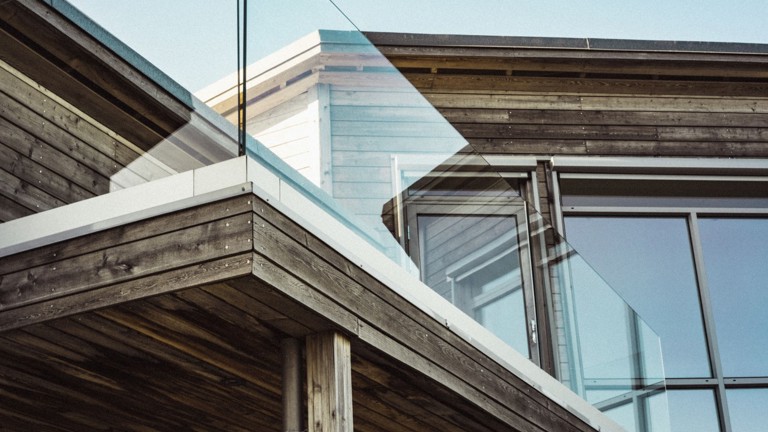 Image looking up and over the balcony of a house